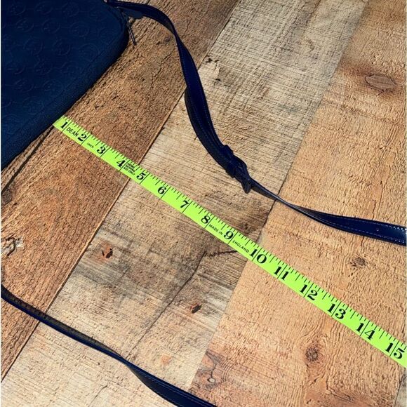 Michael Kors Mono Embossed Neoprene iPad Crossbody Purse Bag
Padded blue - Picture 10 of 16